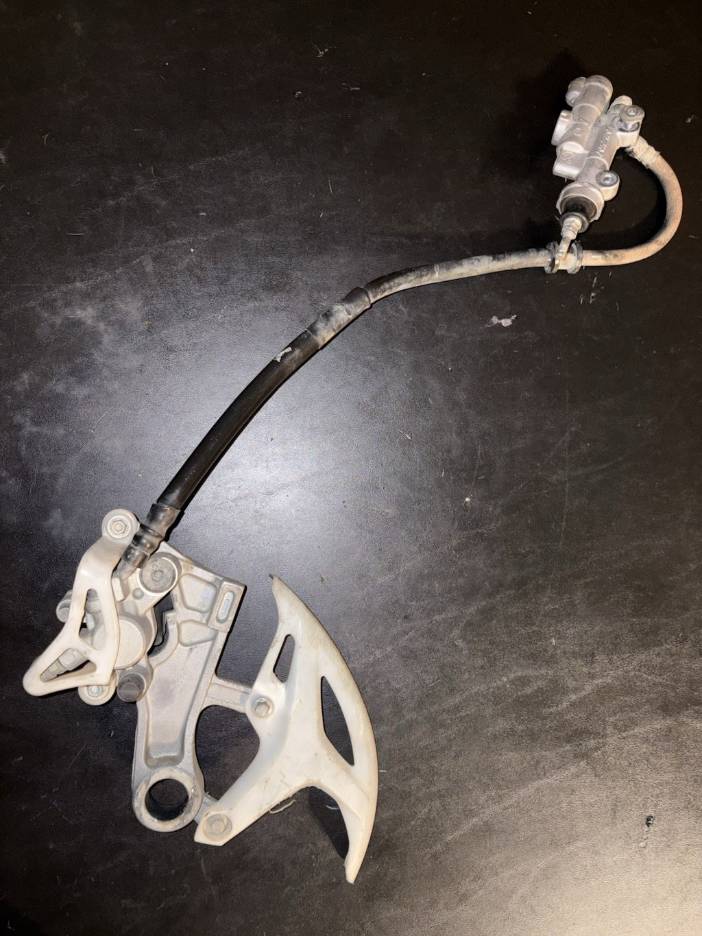 2008 HONDA CRF450R OEM NISSIN REAR BACK BRAKE CALIPER MASTER CYLINDER ASSEMBLY