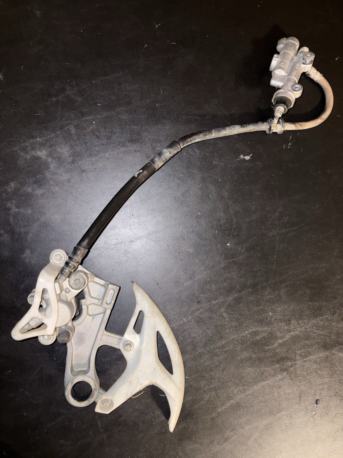 2008 HONDA CRF450R OEM NISSIN REAR BACK BRAKE CALIPER MASTER CYLINDER ASSEMBLY