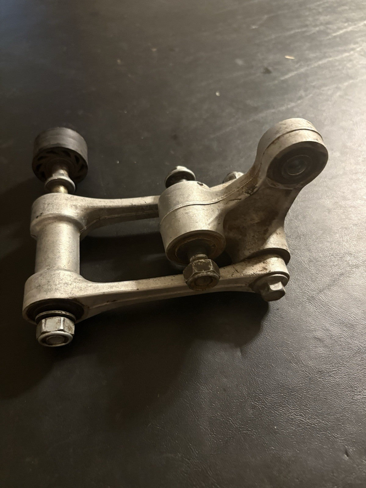 2003-2004 Honda CRF450R Rear Shock Swing Arm Pivot Linkage Oem