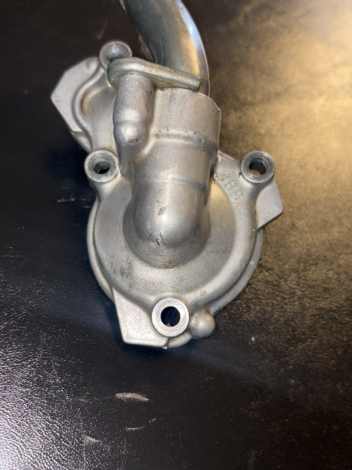 2004 Yamaha 03-09 YZ450F OEM ENGINE WATER PUMP HOUSING COVER 5BE-12422-20-00