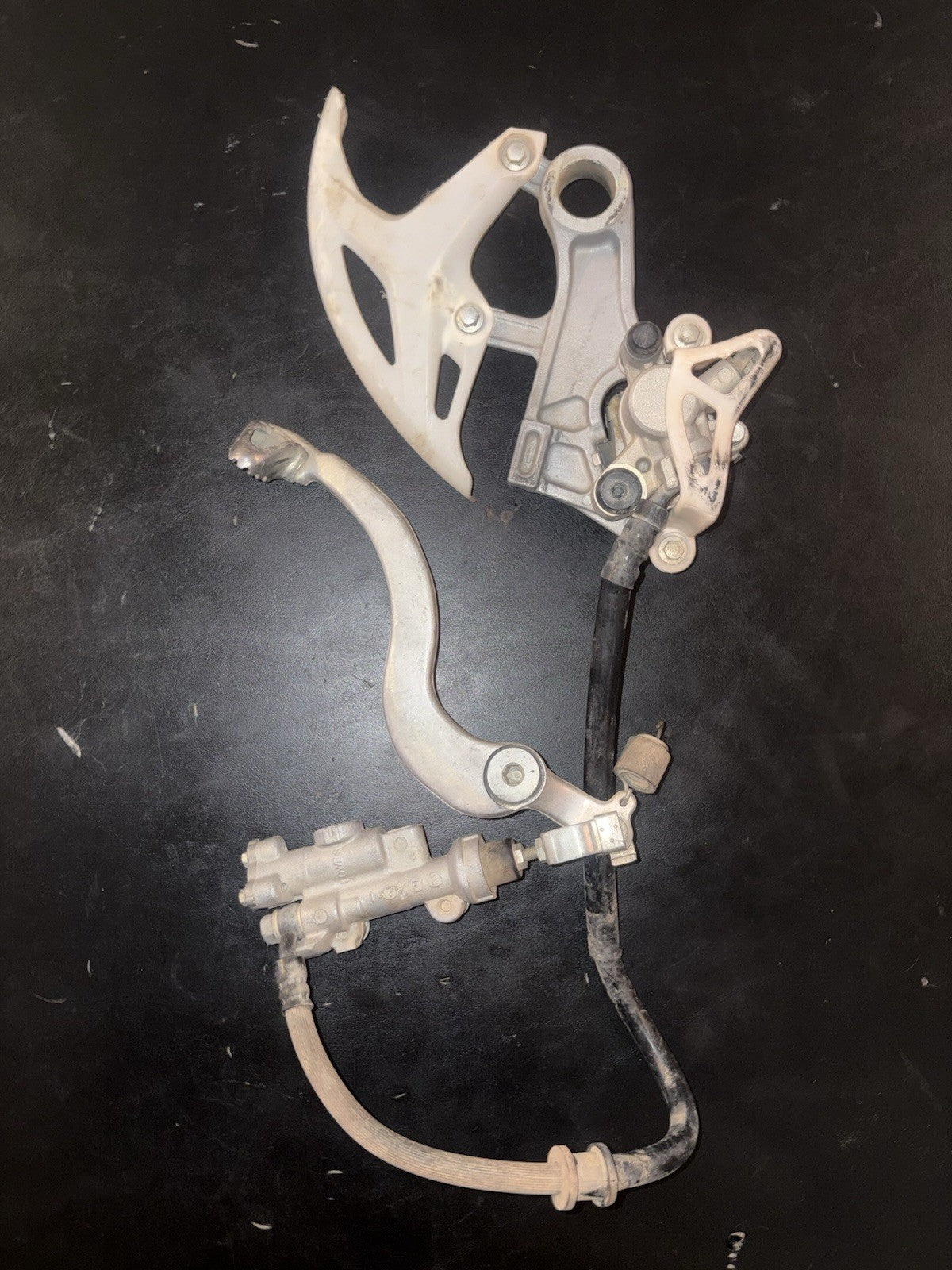 2008 HONDA CRF450R OEM NISSIN REAR BACK BRAKE CALIPER MASTER CYLINDER ASSEMBLY