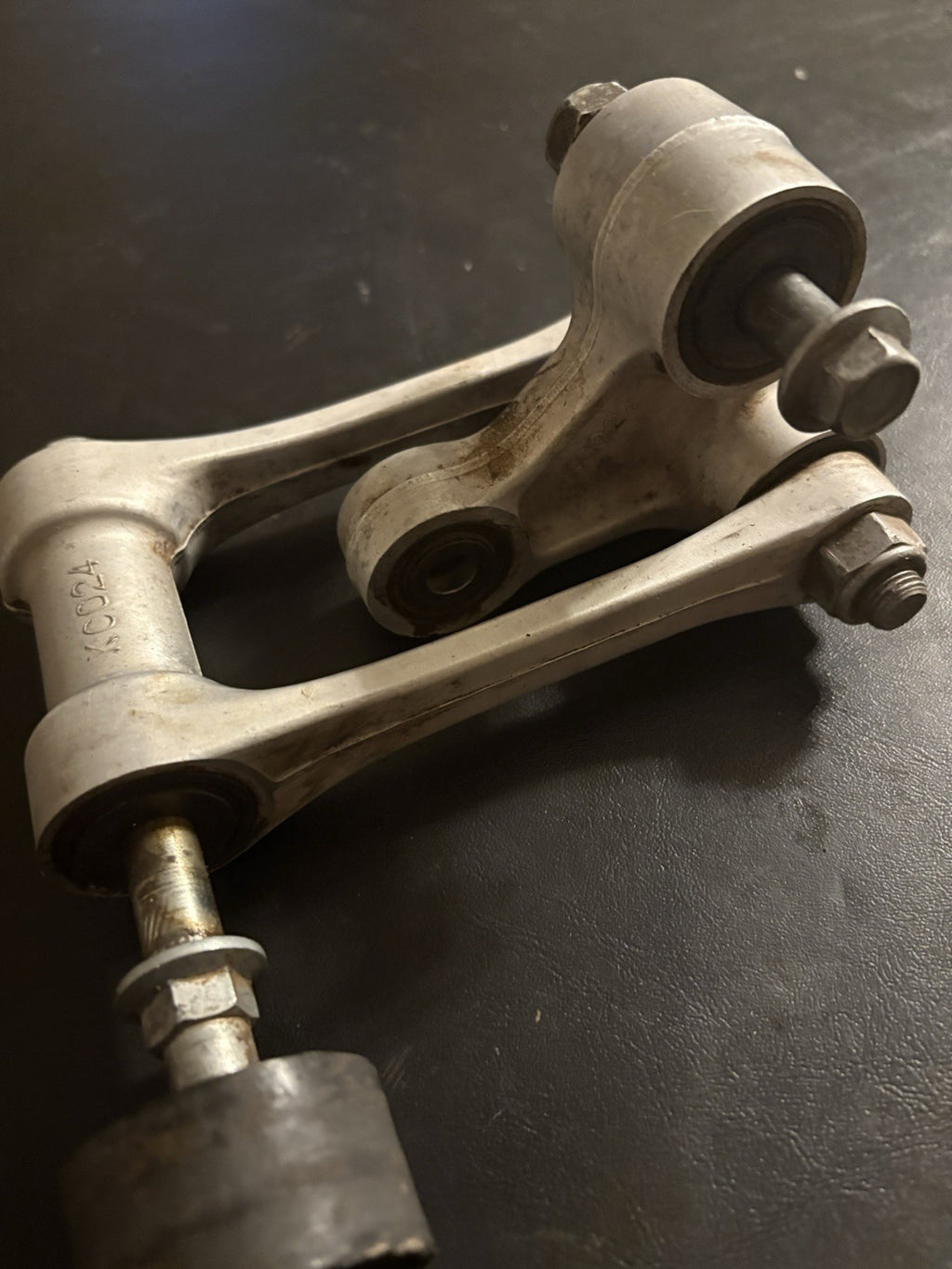 2003-2004 Honda CRF450R Rear Shock Swing Arm Pivot Linkage Oem